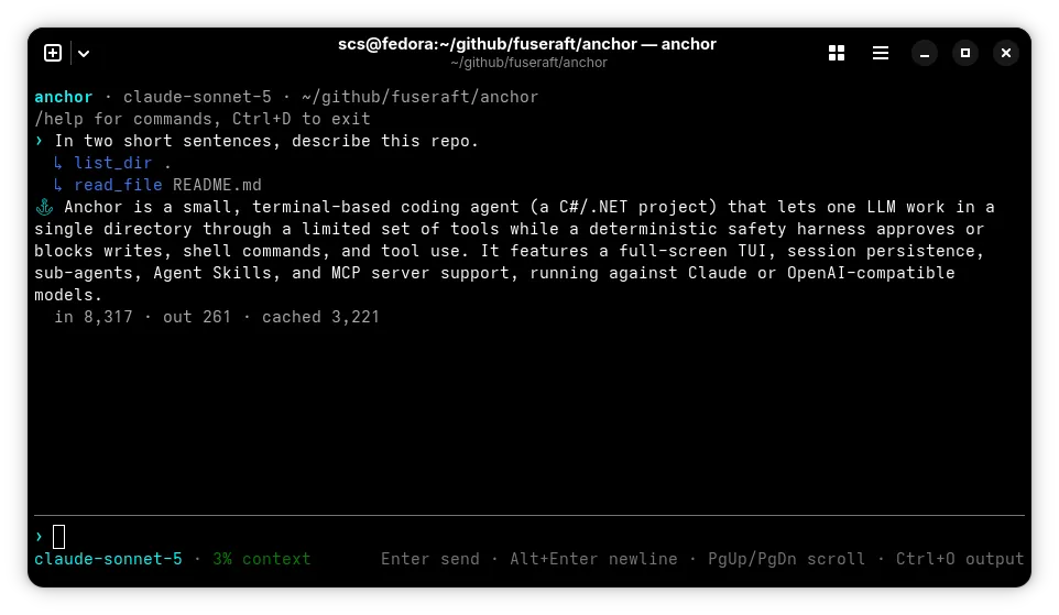 anchor in a terminal: the agent lists the directory, reads README.md and summarizes the repo in two sentences, with token usage and a status line below.